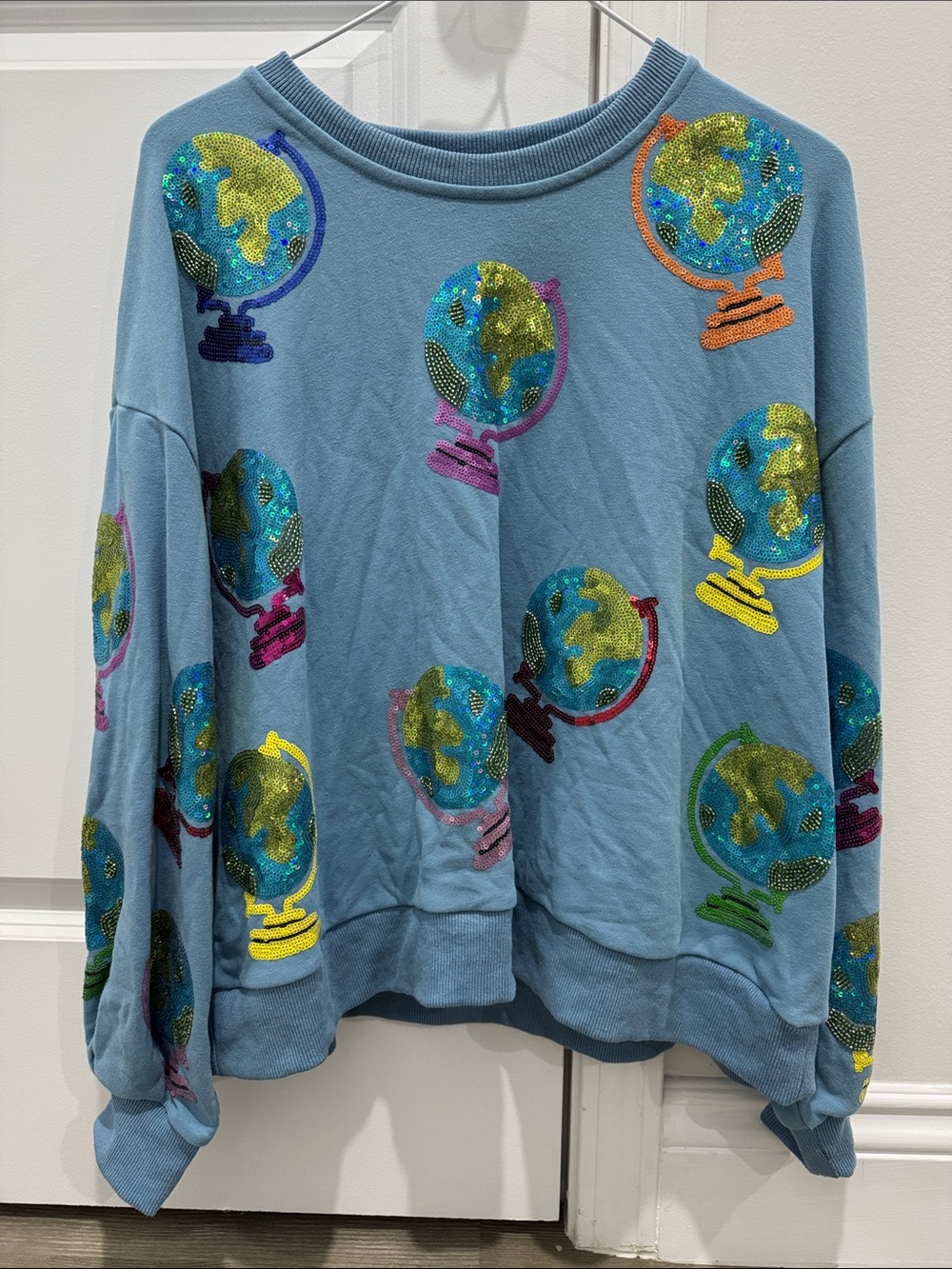QUEEN OF SPARKLES Light Blue Sequin Globe Crewneck Sweater
